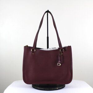 COACH Tyler Carryall (Style #C2273) in Color B4/Wine.